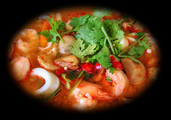 Tom Yum &mdash; spicy and sour Thai soup with shrimp, mushrooms and cilantro